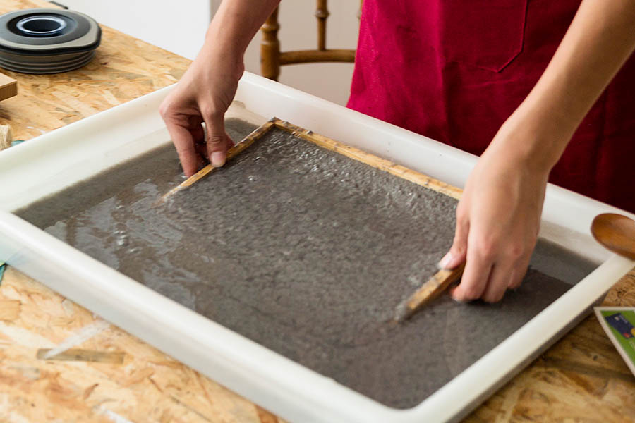 Lady with sand filters for water treatment image